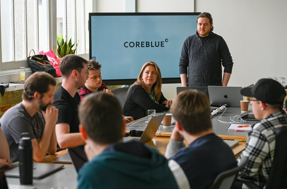 CoreBlue staff having a meeting